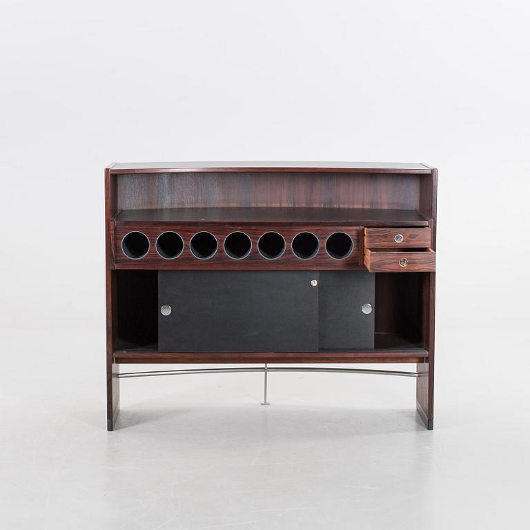 A danish 1960's Smith & Dyrlund bar with three barstools.