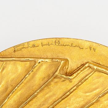 An 18K gold medal Alvar Aalto Finlandia. Designed by Eila Hiltunen. Kultateollisuus, Turku 1974. Numbered 3.