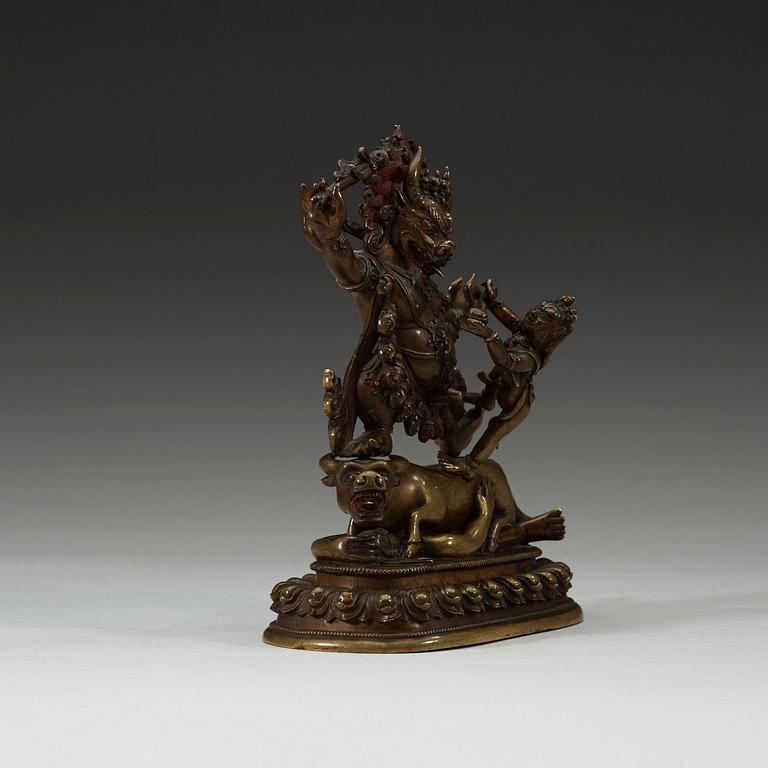 A Mongolian bronze figure of a Dharmapala, early 19th century.