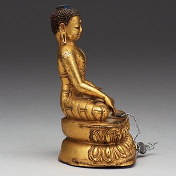 A gilt bronze figure of Buddha, Qing dynasty (1644-1911).