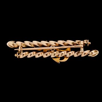 BROSCH, 14 k, guld, med turkoser. Total vikt ca 6 g.