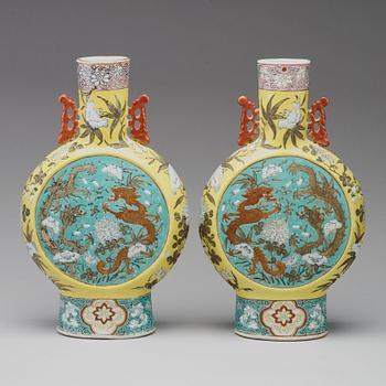 A pair of enamelled moon flasks, Qing dynasty, circa 1900.