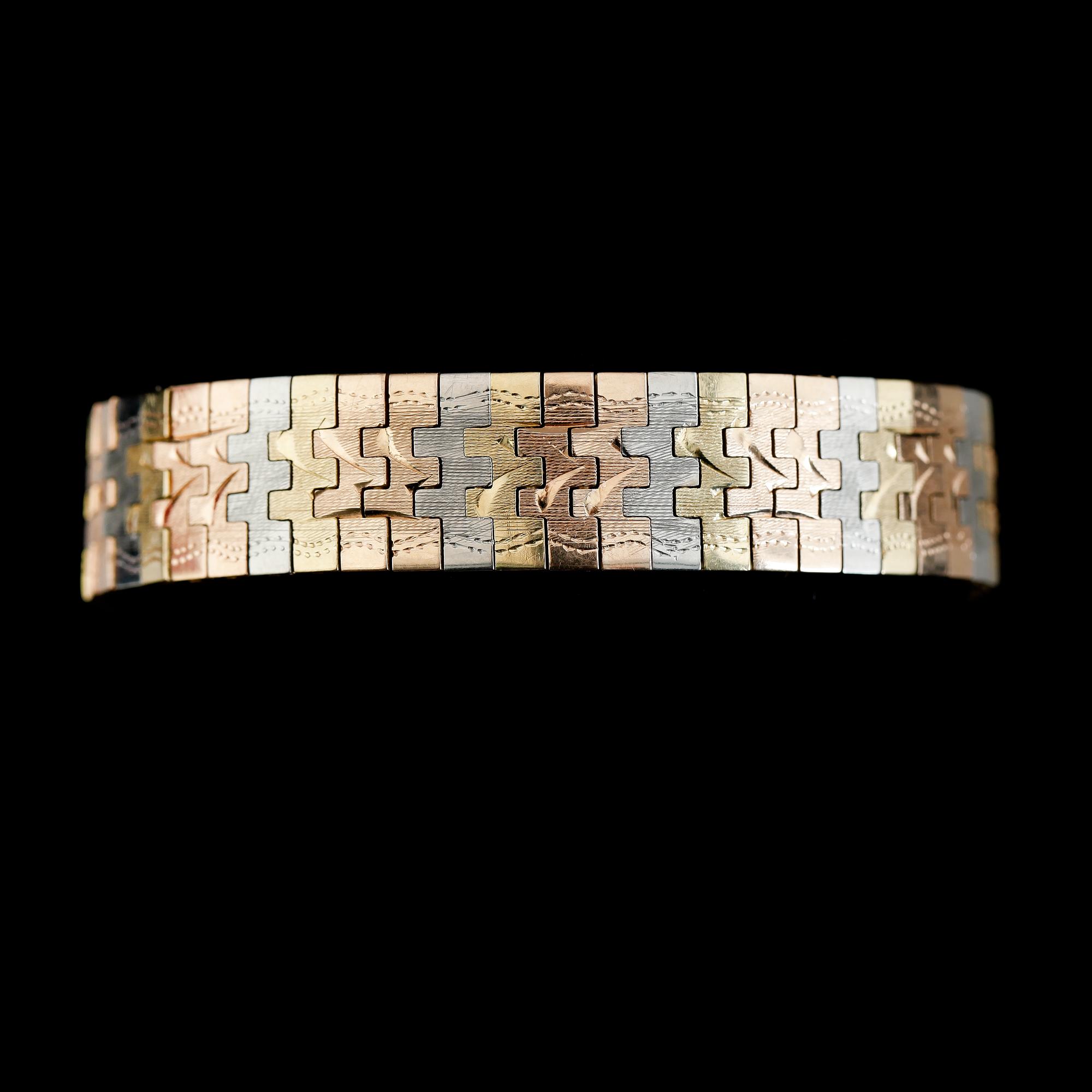 ARMBAND, 18K guld, flerfärgat guld. Vikt ca 35 gram.