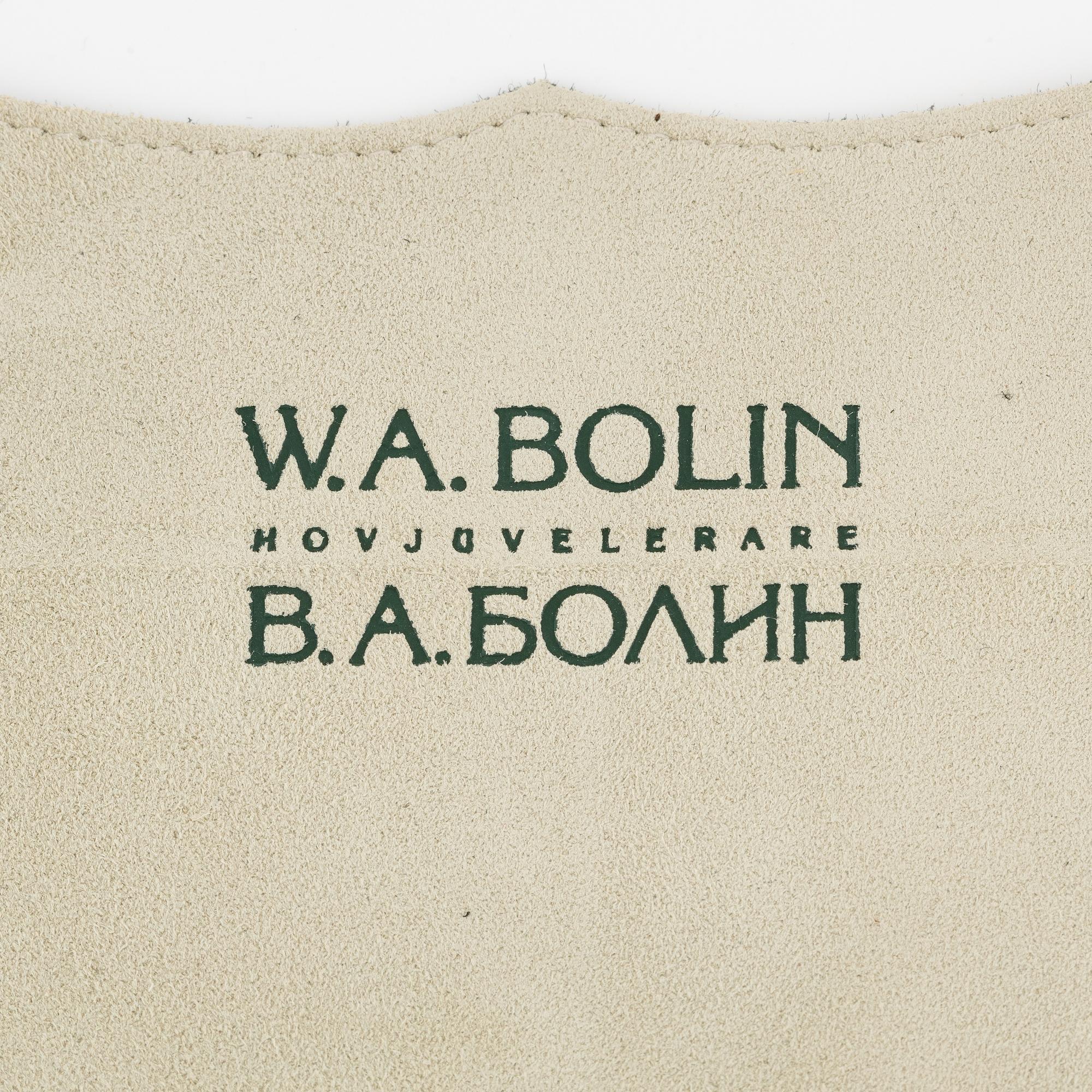 A platinum necklace set with navette-, pear- and round-brilliant-cut diamonds.