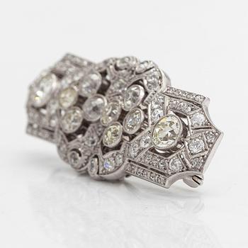 A 14K white gold Art Deco double clip brooch with old-cut diamonds approximately 4.90 cts in total. Austrian importmark.