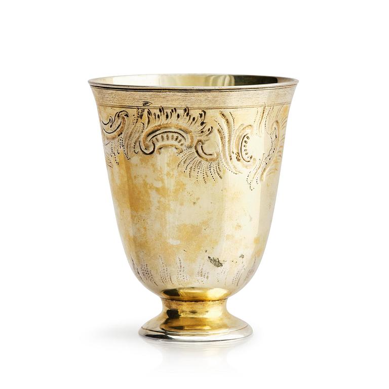 A German 18th century gilt-silver beaker on foot, mark of Johann Gottfried Hildebrand, Berlin probably 1760s.