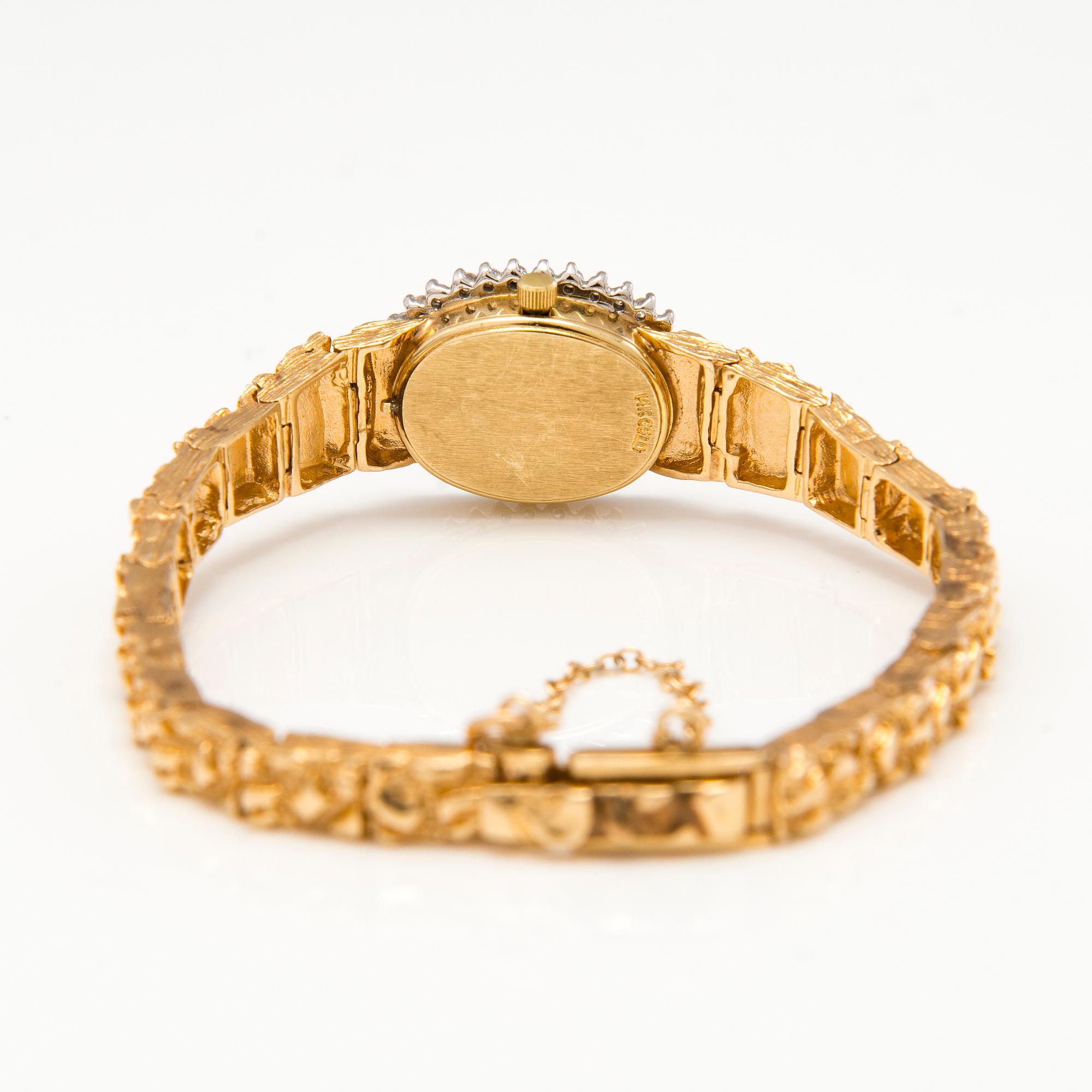 OMEGA, wrist watch, quartz, 14K gold, diamonds ca. 0.38 ct in total. 18 mm.