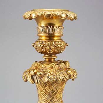 A pair of French Empire candlesticks, first half of the 19th century.