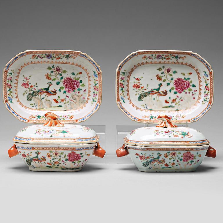 A pair of famille rose 'double peacock' butter tureens with cover and stand, Qing dynasty, Qianlong (1736-95).