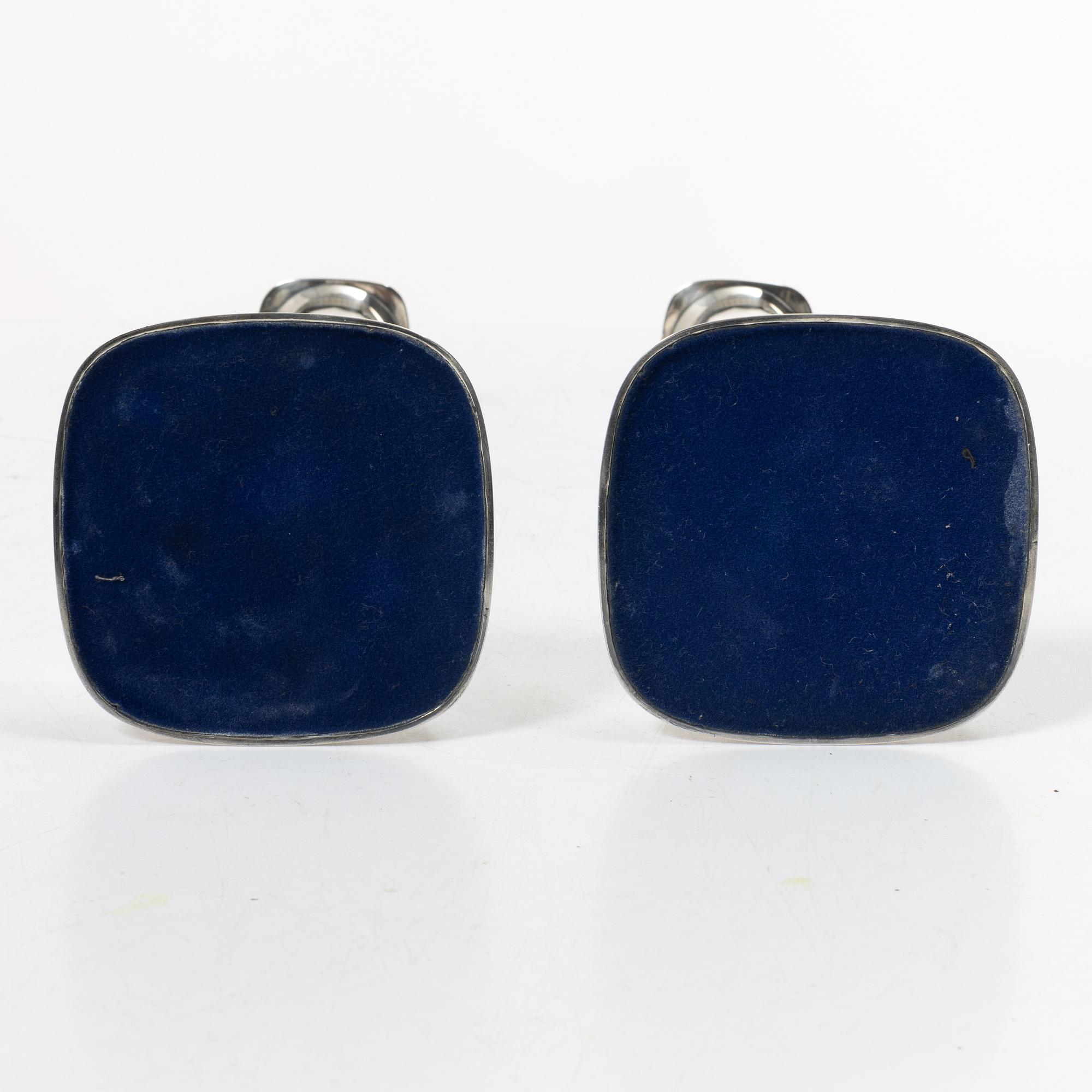 Guldsmedsaktiebolaget (GAB), a pair of silver candlesticks, design Sven-Arne Gillgren, Stockholm 1963.