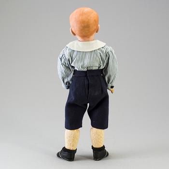 A bisque head character doll marked 226, probably France, 1910s.