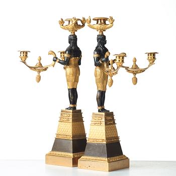 A pair of Empire three-light candelabra, circa 1810.