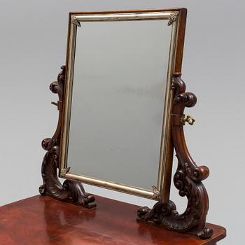 A mid 19th century late empire dressing table.