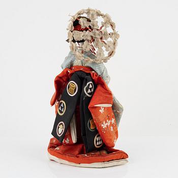 A Japanese doll, early 20th Century.