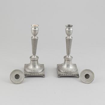 A pair of pewter candle stick by Anjou, Norrköping 1804.