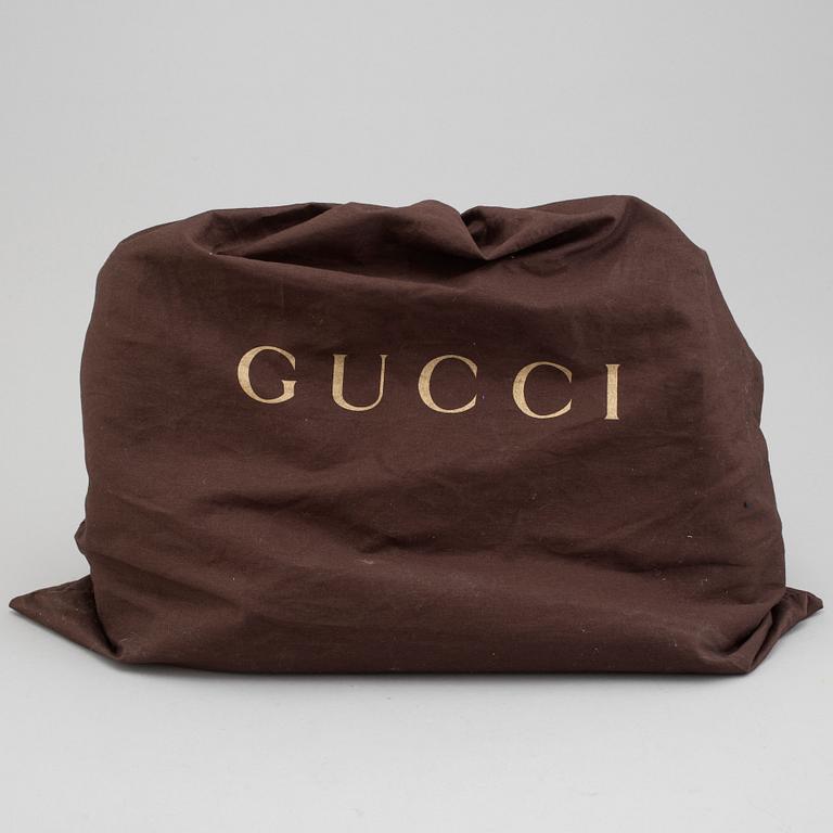 A 'Morsetto' leather bag by Gucci.