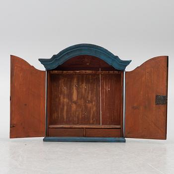 A wall cabinet, 18th century.