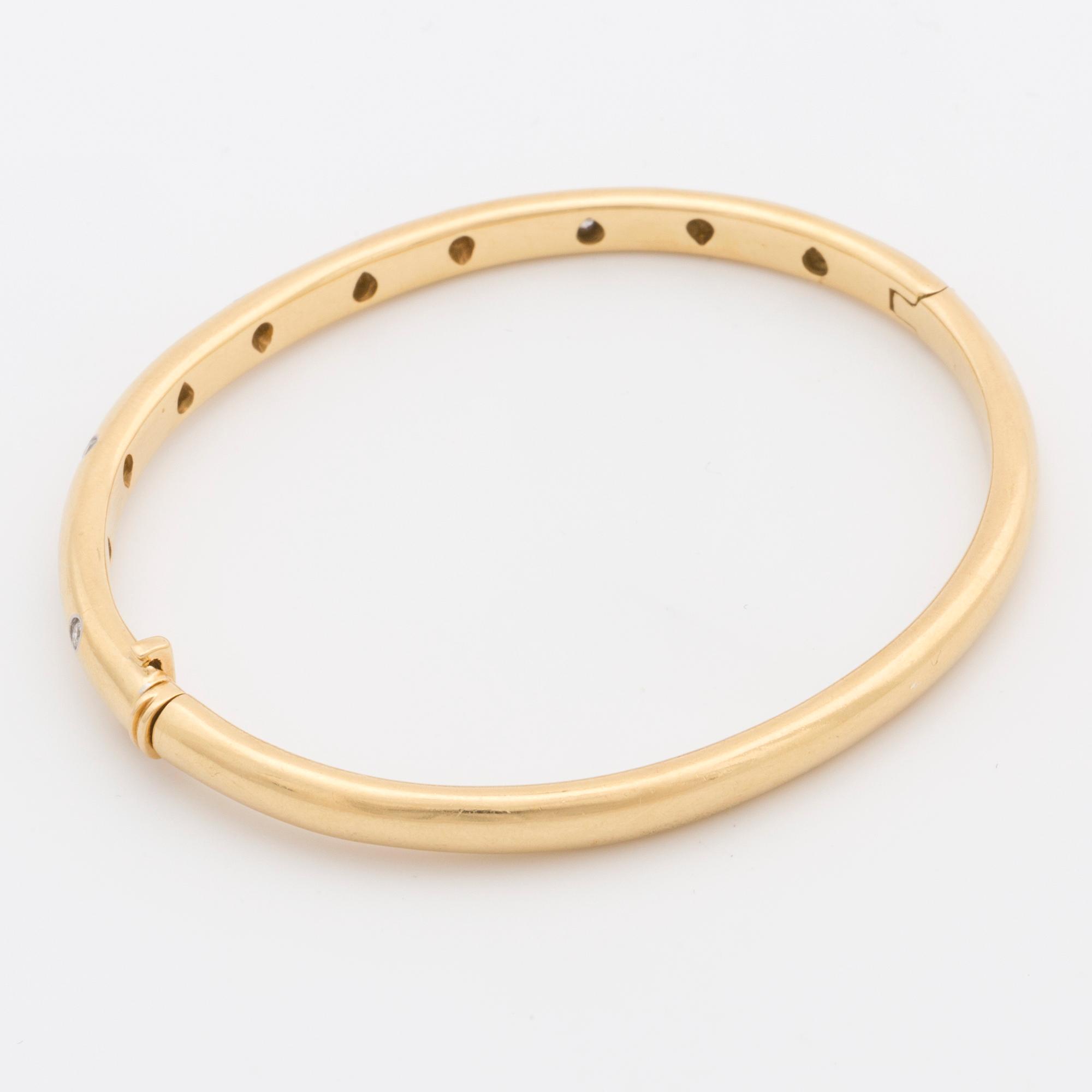 TIFFANY & Co, armring med briljantslipade diamanter ca 0.20 ct.