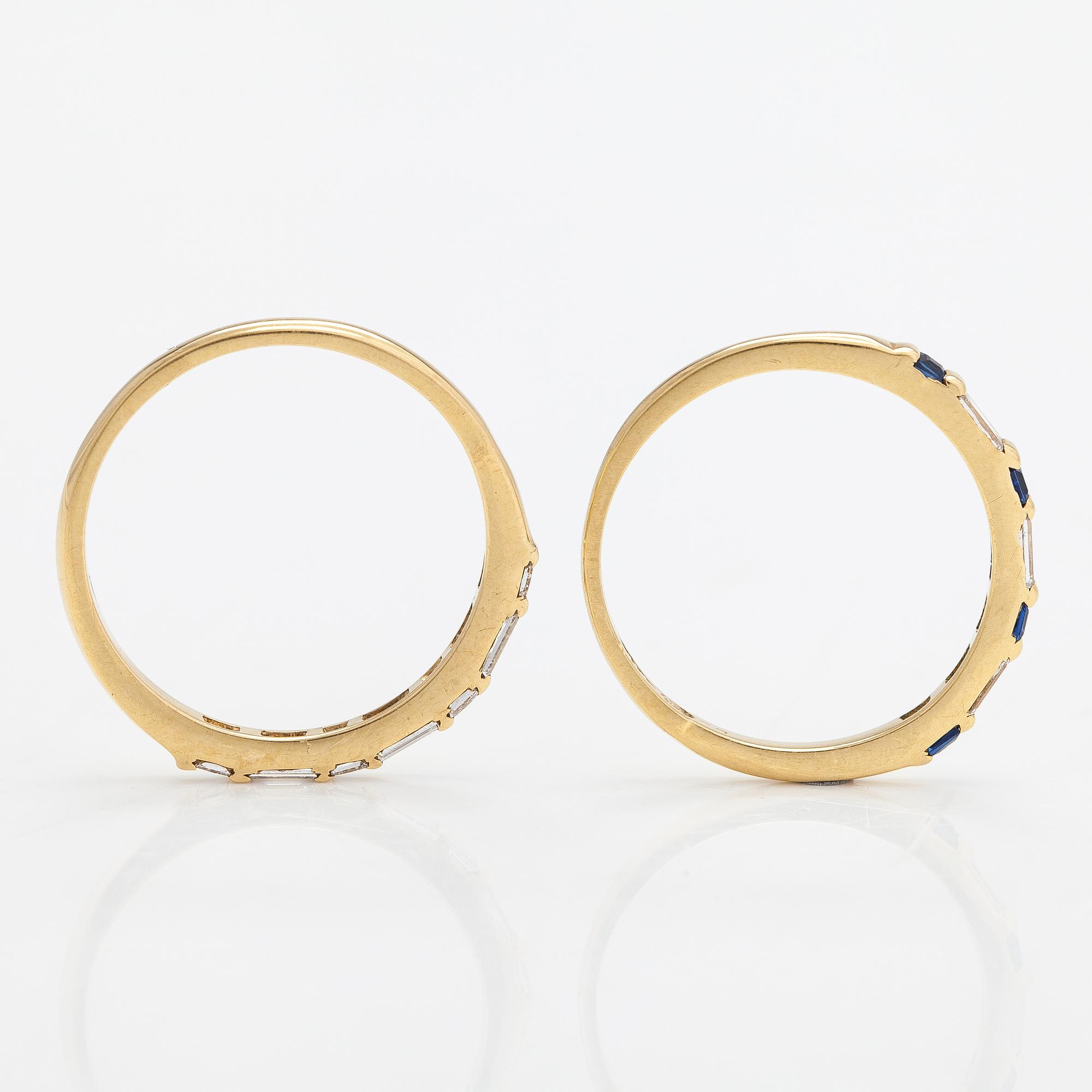 A set of 2 rings made of 18K gold with diamonds ca. 0.39 ct in total and sapphires.