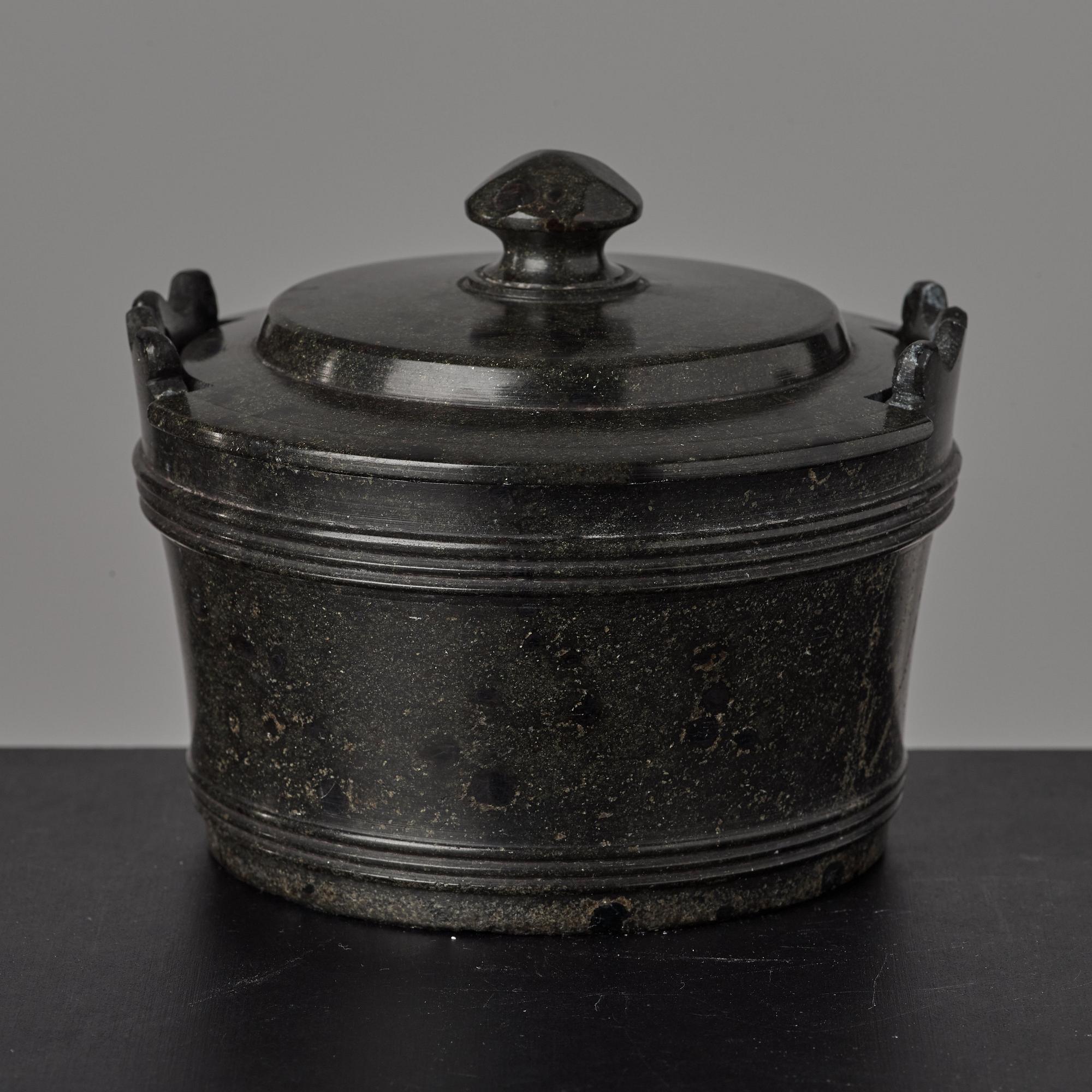 A serpentine stone butter box and cover circa 1800.