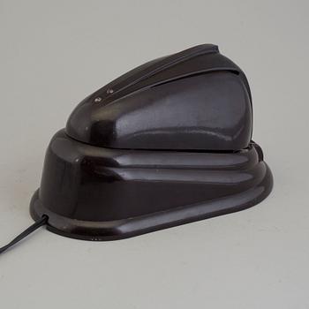 a bakelite and metal table 'Bolide' table lamp, by JUMO, 1940's.