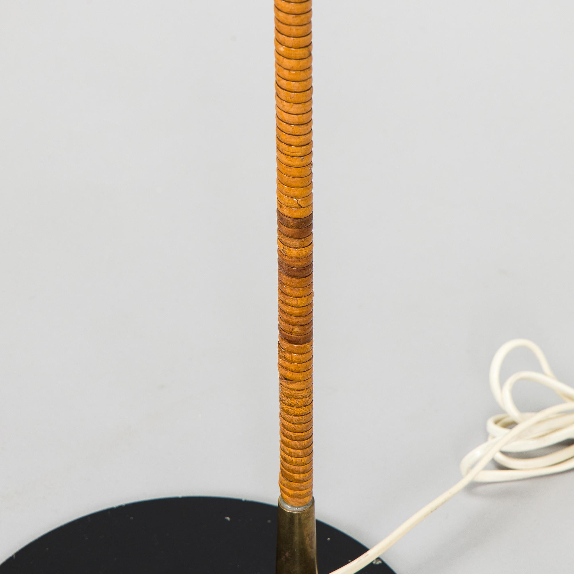 Paavo Tynell, a pair of mid-20th century K10-10 floor lamps for Taito Finland.