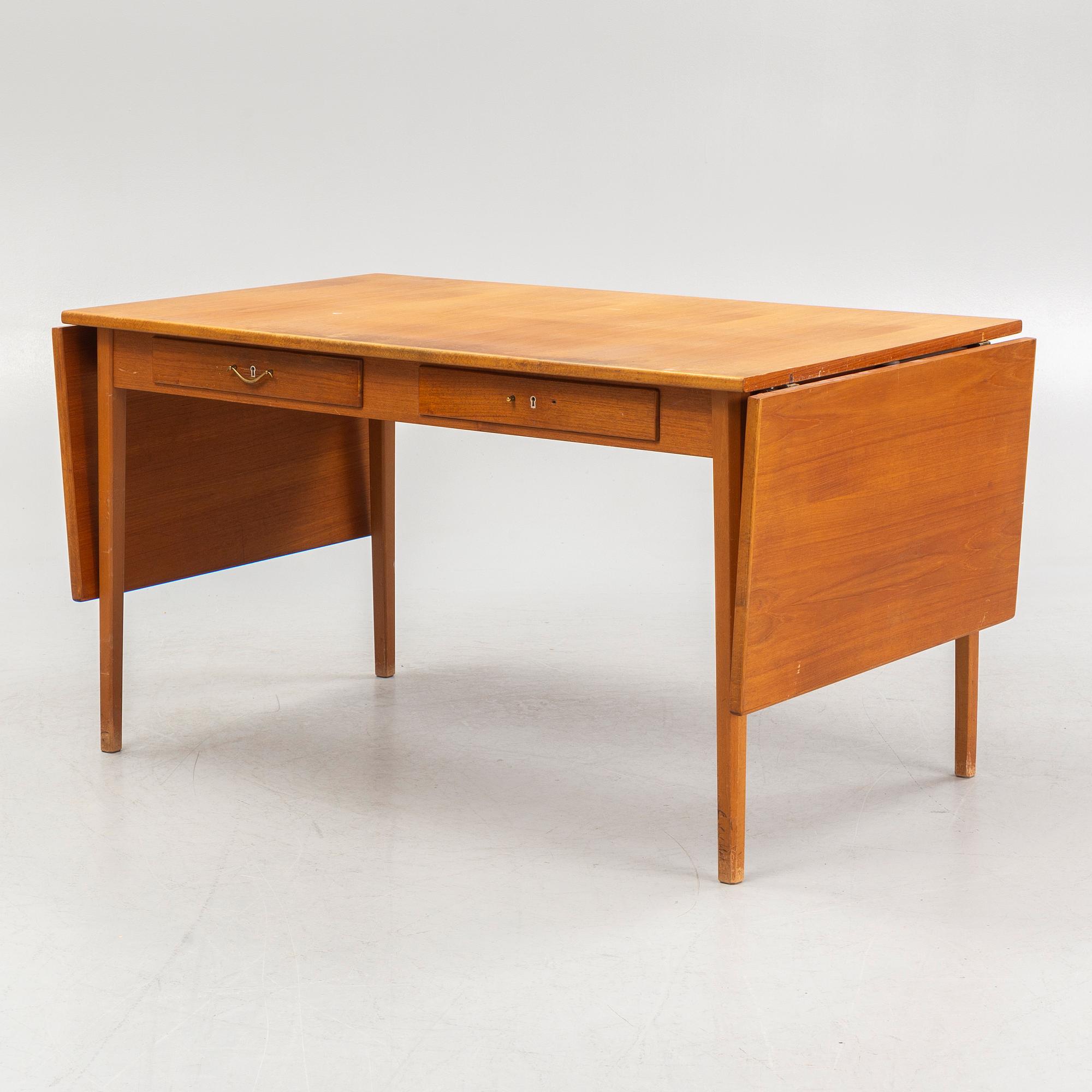 Folke Andersson, an 'Aristo' chair and a desk, Hugo Troeds, Bjärnum, mid 20th Century.