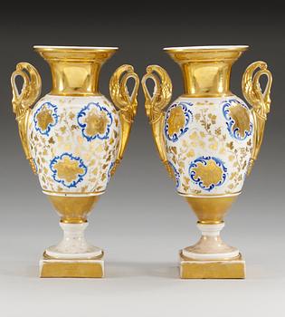 A pair of French Empire vases.