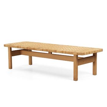 93. A Børge Mogensen oak and rattan bench, Fredericia Stolefabrik, Denmark.