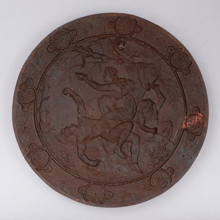 SKÖLD, gjutjärn, omkring år 1900.