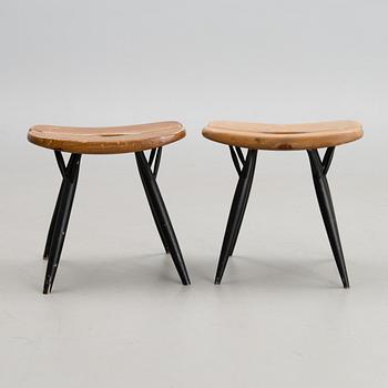 A pair of Pirkka stools manufactured by Laukaan Puu and designed in 1955.