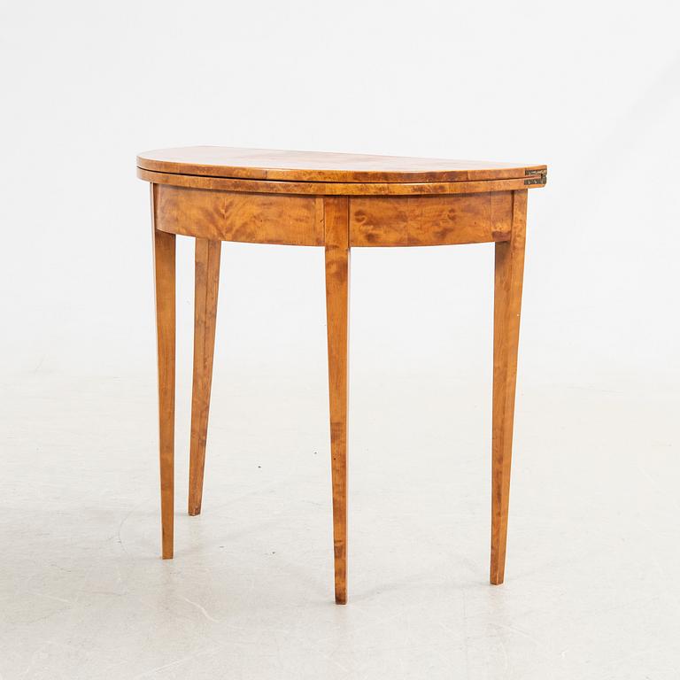 Half-moon table, 19th century.