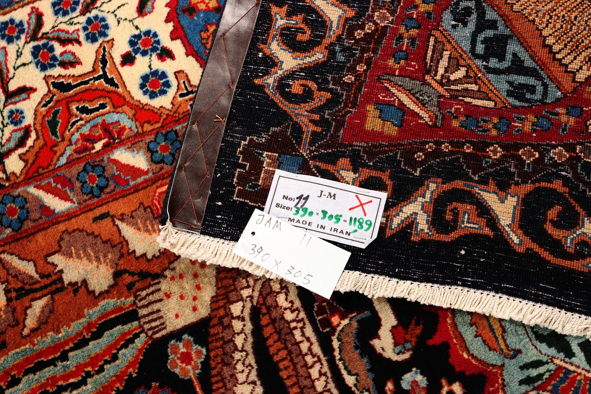 A Kashmar carpet, a. 390 x 305 cm.