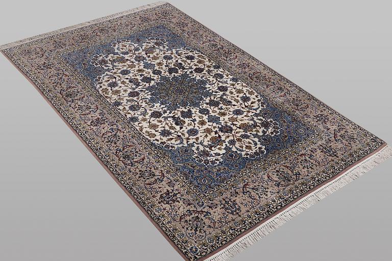 A rug, Esfahan, part silk, ca 245 x 155 cm.