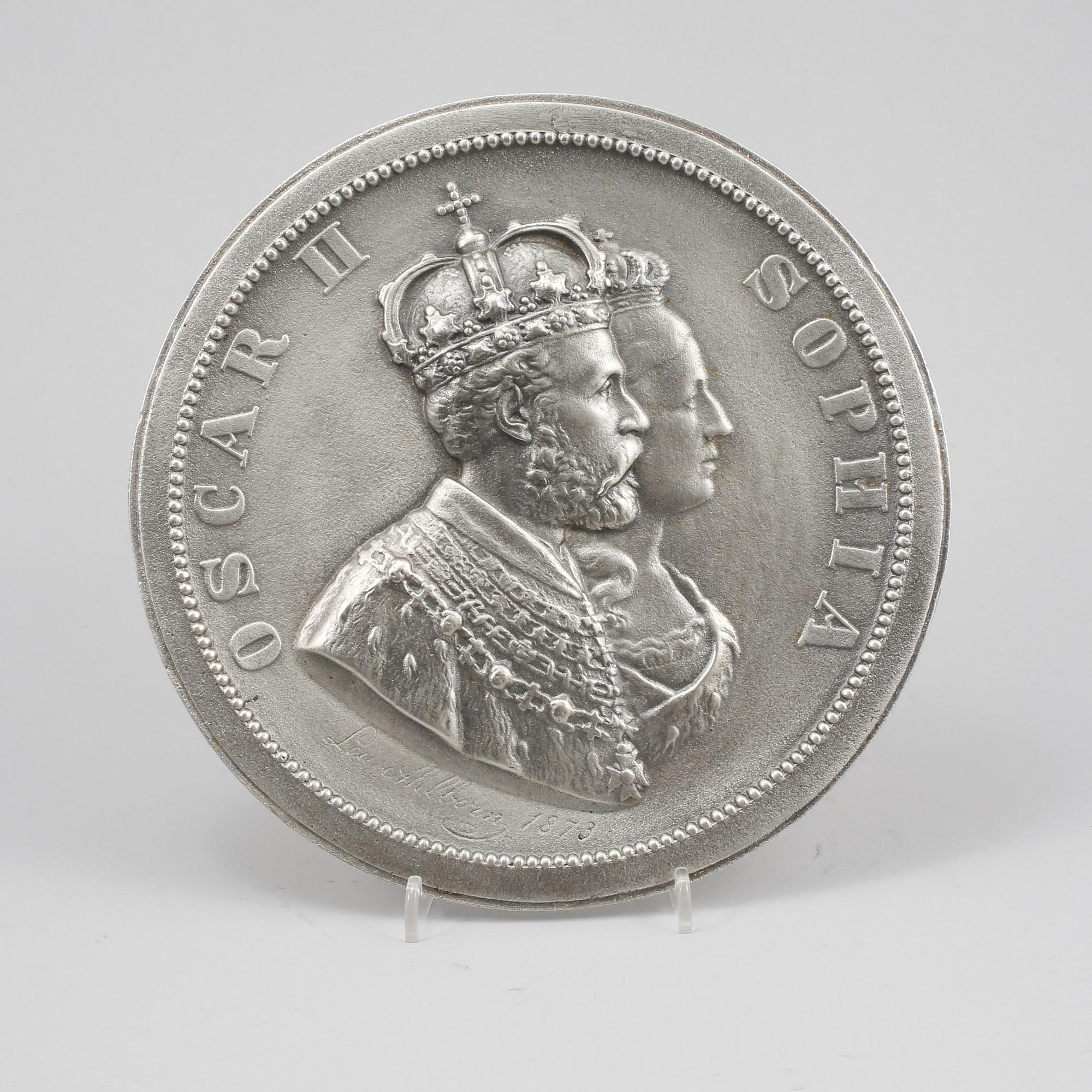 MEDALJONG, signerad Lea Ahlborn och daterad 1873.