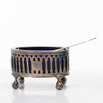 Two silver salt cellars, and a mustard pot, French hallmarks, late 18th Century.
