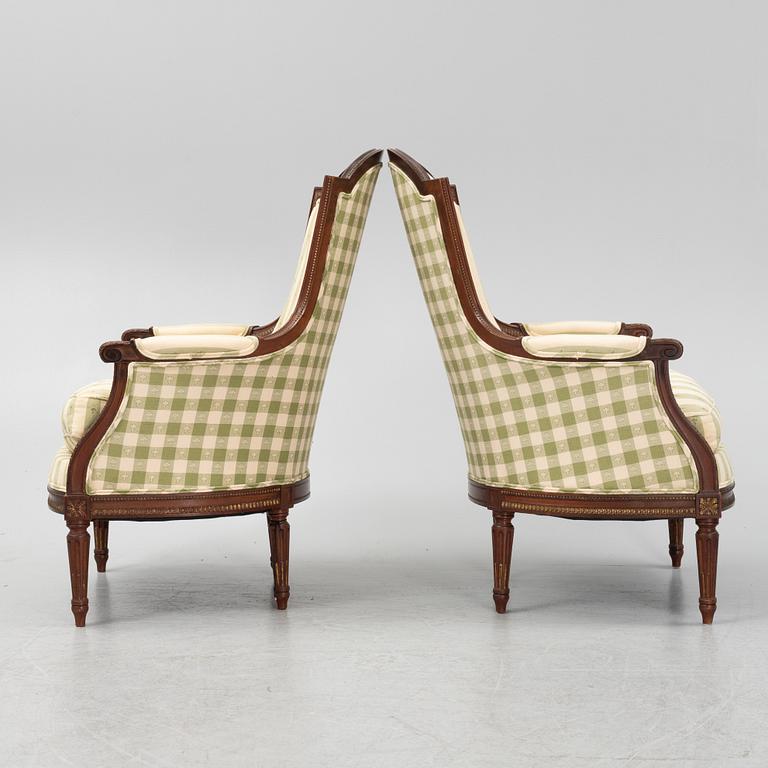 A pair of bergère armchairs, Louis XV style.