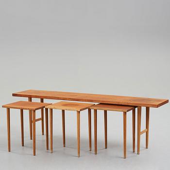 Kurt Østervig, a teak set of four nesting tables, Jason Møbler, Denmark 1950's.