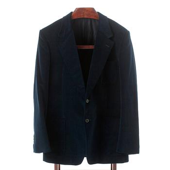 YVES SAINT LAURENT, a blue velvet jacket.