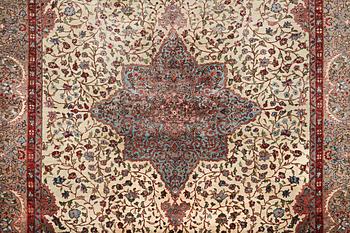 An Eastern European carpet, c. 333 x 250 cm.