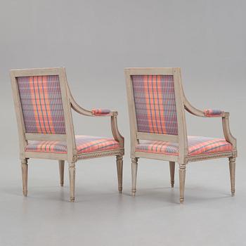 Two matched Gustavian armchairs, by Jakob Malmsten (master in Stockholm 1780-88).