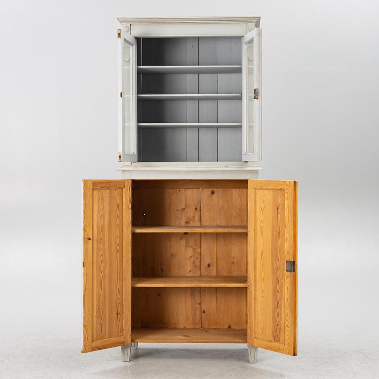 A display cabinet, early 20th century.