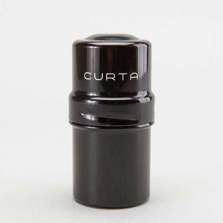 A 'Curta, Type I' calculator developed by Curt Herzstark, Contina AG Mauren, Lichtenstein, designed in 1947.