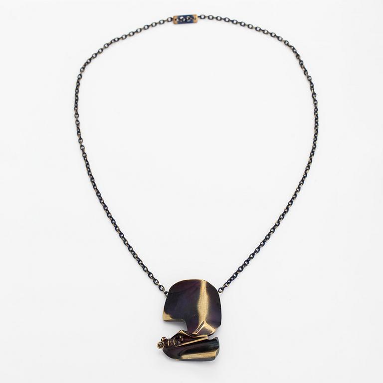 Björn Weckström, A flame bronze necklace "International arms Inc" and ring "Henry J". Lapponia.