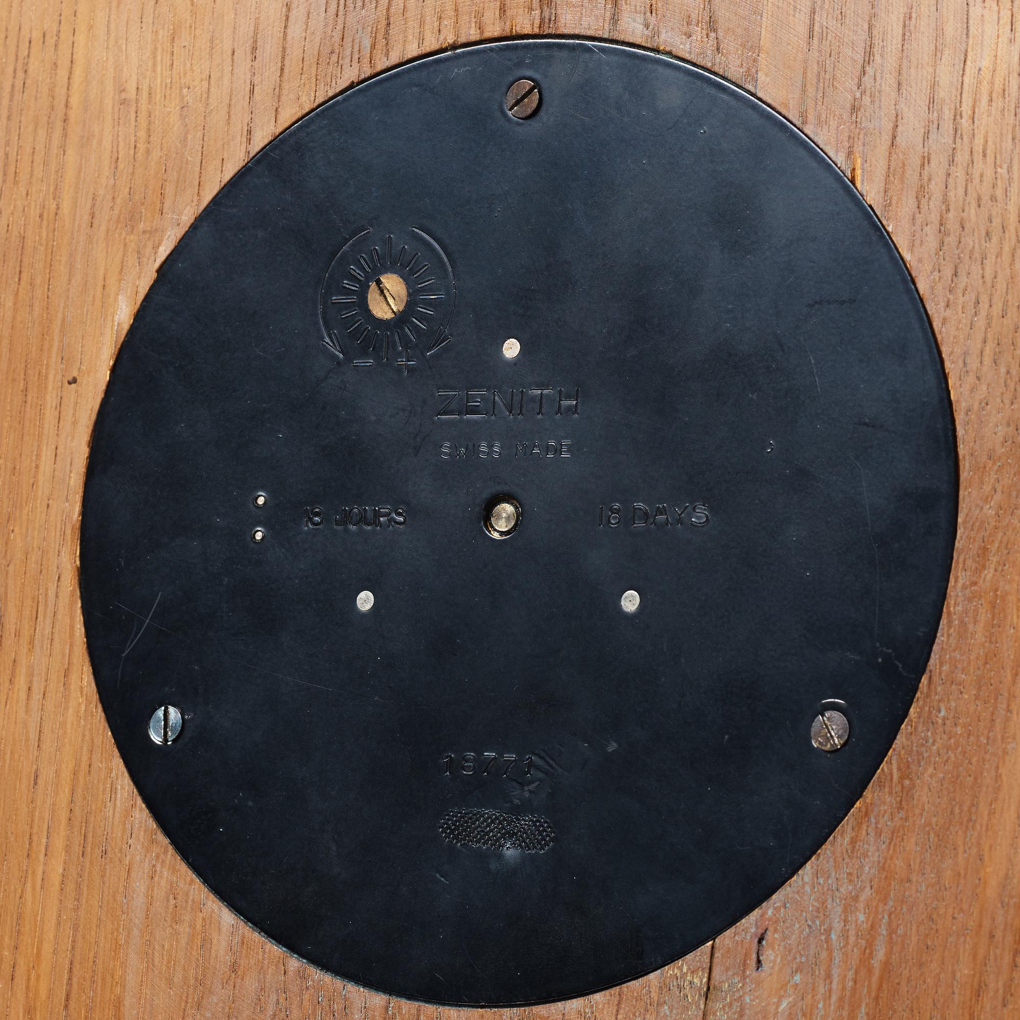 A wall clock, marked Zenith, Swiss made, 18 jours. 18771.