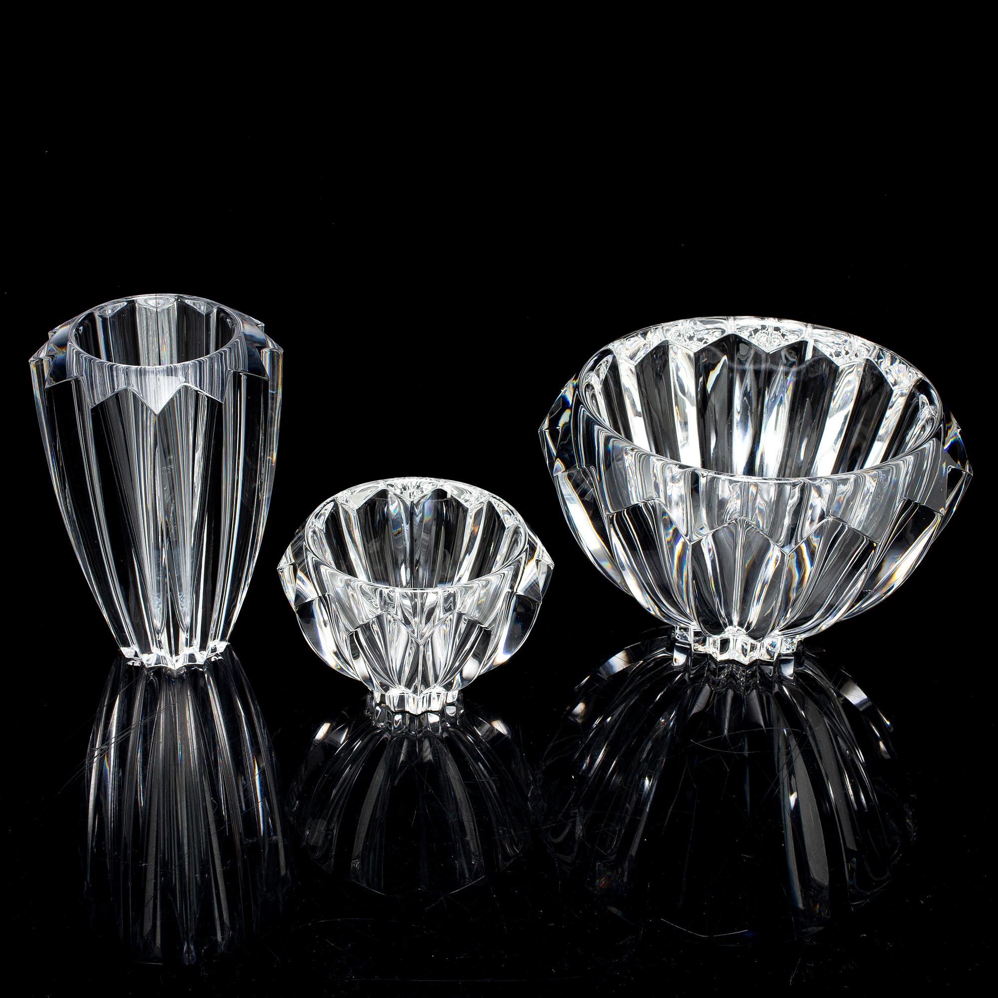ERIKA LAGERBIELKE, a glass 'Zodiak' vase and two bowls from Orrefors.