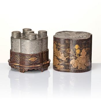 A Chinese lacquer box with a set of five pewter tea caddies, Qing dynasty, 18/19th Century.