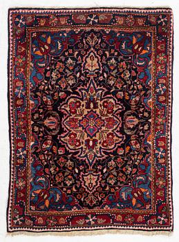 A Sarouk/Jozan rug, c. 86 x 64 cm.