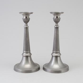 a pair of pewter candle sticks by B O Santesson Stockholm 1983.