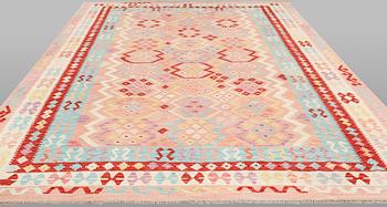 A Kelim carpet, c. 343 x 256 cm.